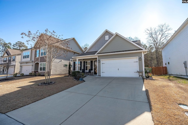 view of front of home featuring a porch and a garage