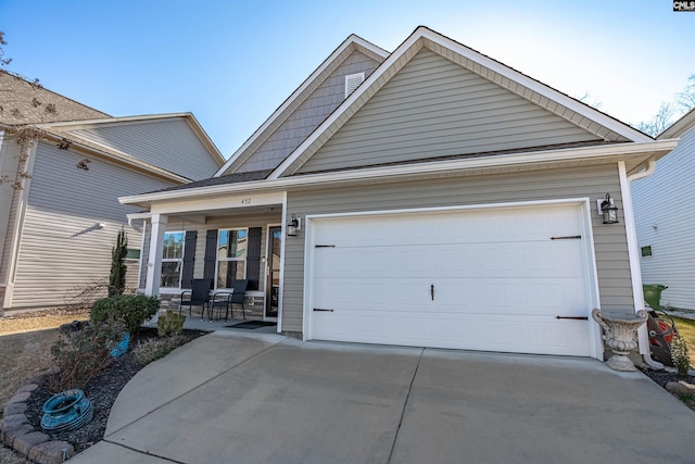 craftsman-style house featuring a garage and a porch