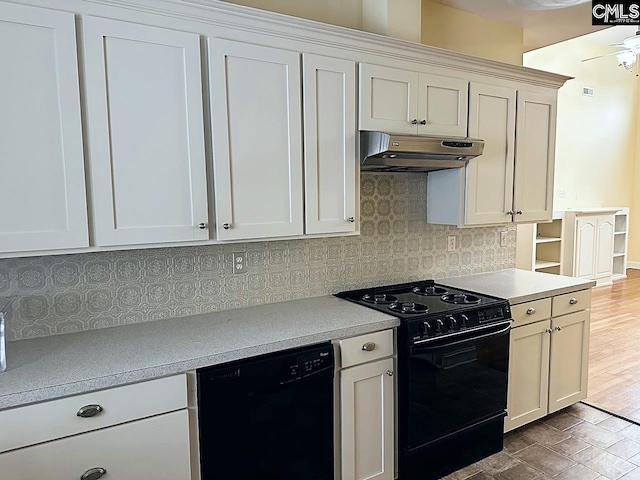 kitchen with hardwood / wood-style floors, ceiling fan, decorative backsplash, white cabinets, and black appliances