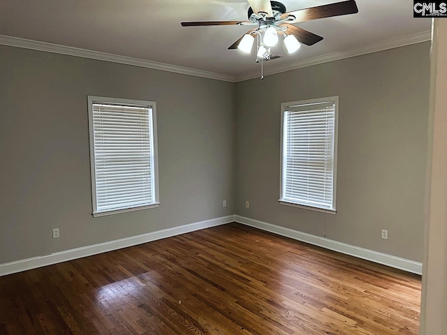 empty room featuring ceiling fan, hardwood / wood-style floors, and ornamental molding