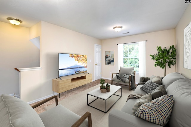 living room with light colored carpet