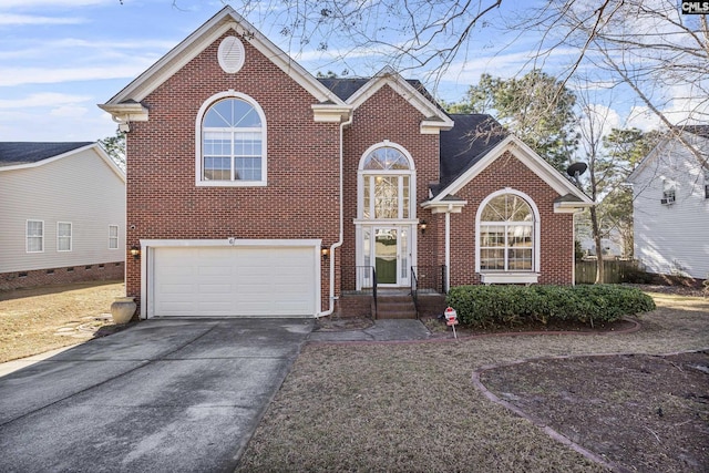 front of property with a garage