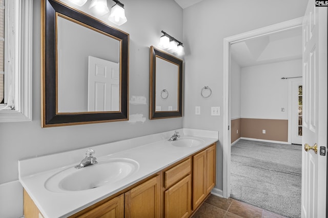 bathroom with vanity and tile patterned flooring