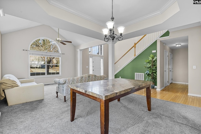 dining area featuring plenty of natural light, ceiling fan with notable chandelier, and ornamental molding