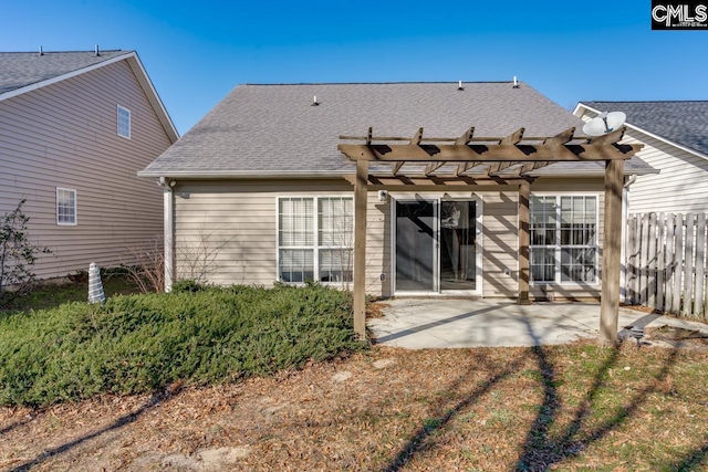 back of house with a patio and a pergola