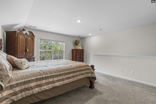 carpeted bedroom with lofted ceiling, recessed lighting, visible vents, and baseboards