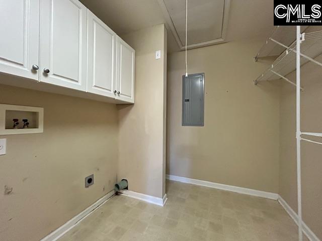 clothes washing area featuring hookup for a washing machine, hookup for an electric dryer, cabinet space, electric panel, and attic access