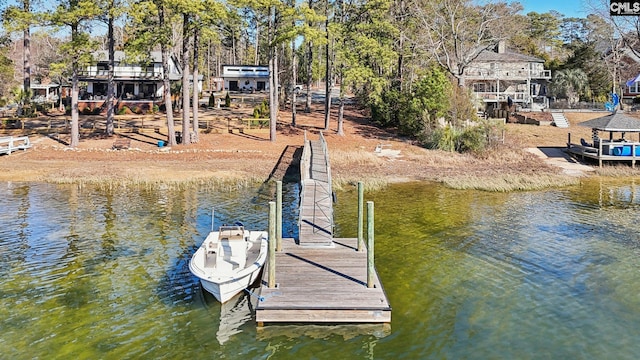 view of dock with a water view