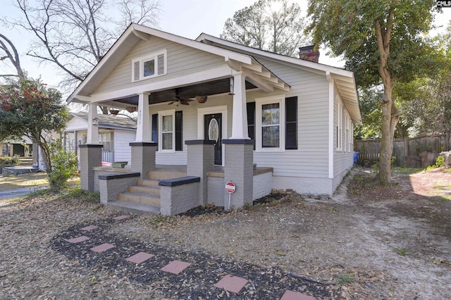 bungalow featuring ceiling fan and a porch