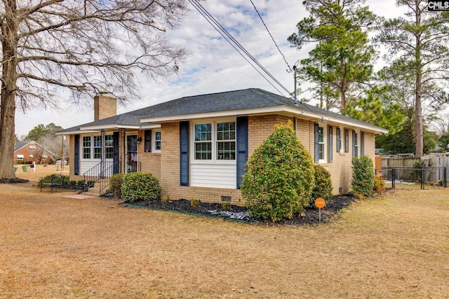 view of front of home with a front yard