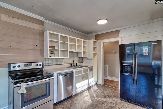 kitchen featuring stainless steel appliances, decorative backsplash, crown molding, white cabinets, and sink