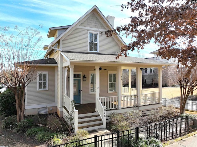 farmhouse-style home with ceiling fan and a porch