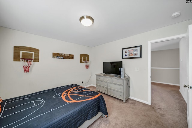 bedroom with light colored carpet