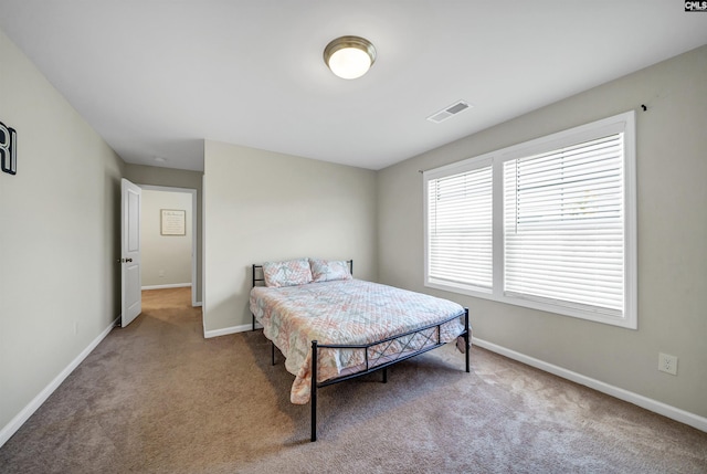 bedroom featuring carpet flooring