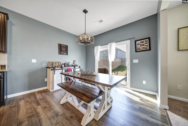 dining room featuring dark wood-type flooring