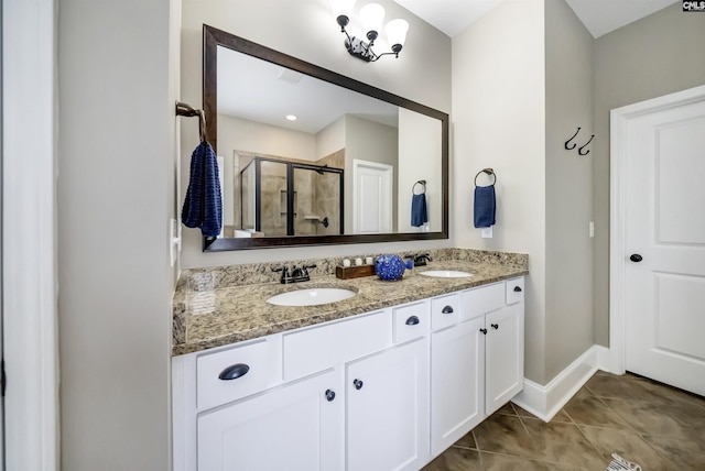 bathroom with vanity, tile patterned floors, and walk in shower