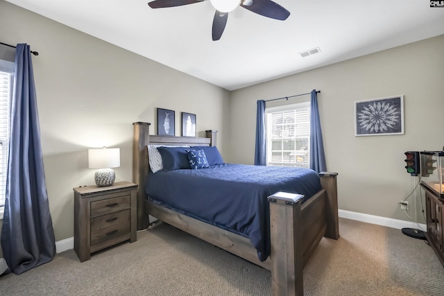 carpeted bedroom featuring ceiling fan