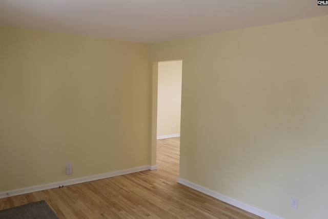 spare room featuring light wood-type flooring