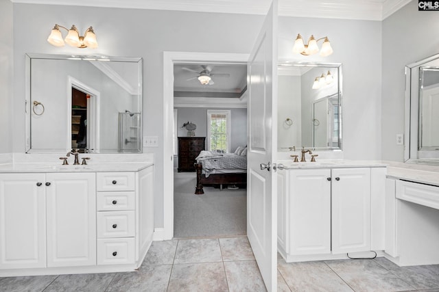 bathroom with ceiling fan, tile patterned flooring, and crown molding