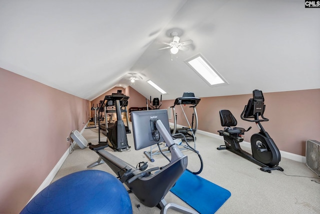 workout area featuring ceiling fan, light carpet, and vaulted ceiling