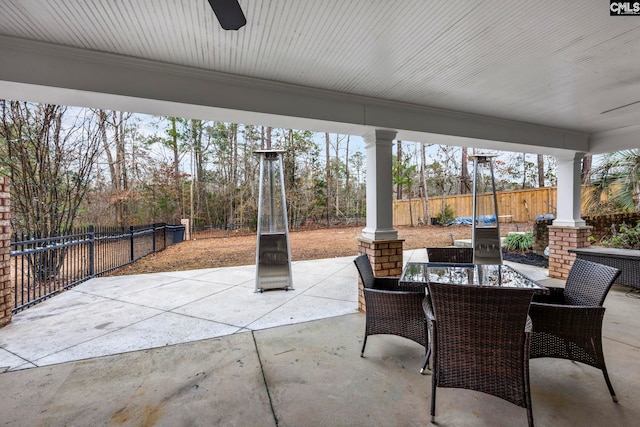 view of patio featuring ceiling fan