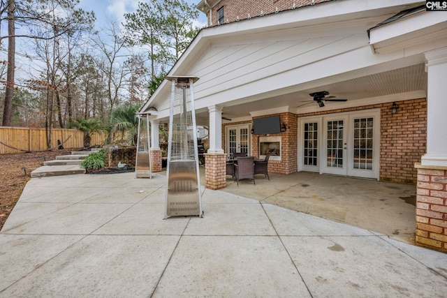 view of patio / terrace with ceiling fan and french doors