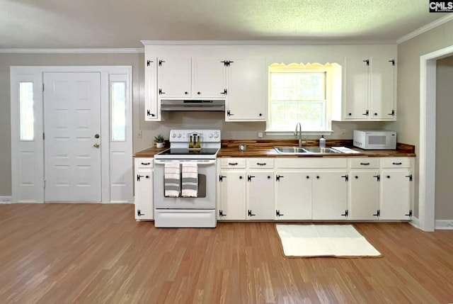 kitchen with light wood-type flooring, sink, white cabinets, and white appliances