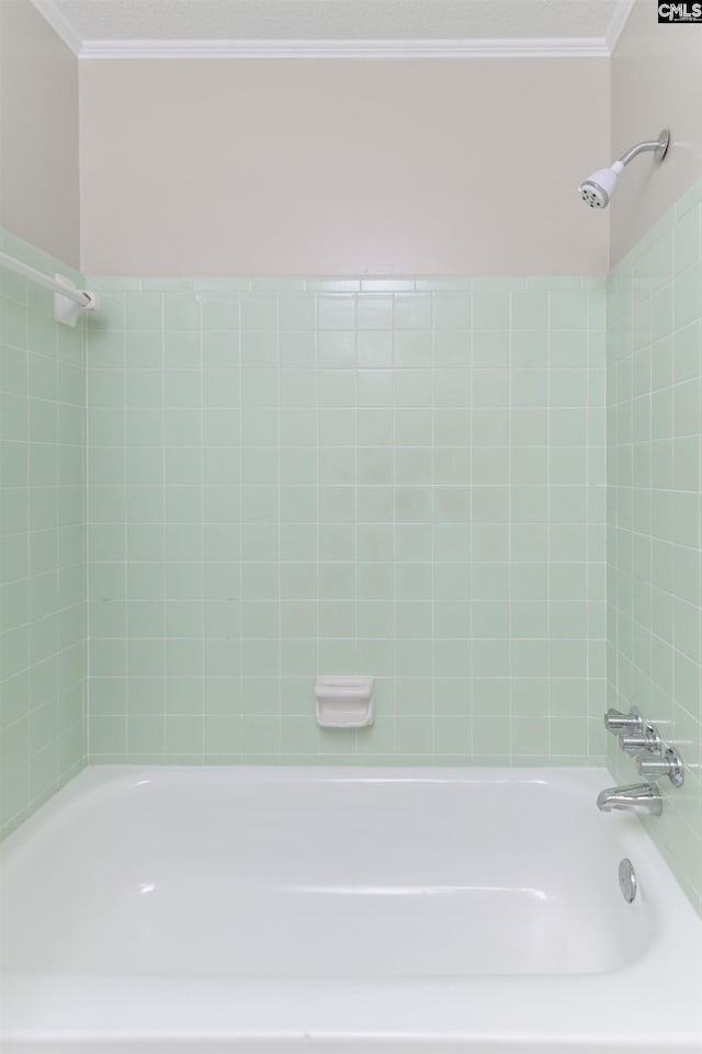 bathroom featuring shower / bath combination and ornamental molding