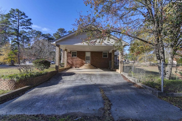 exterior space with a carport