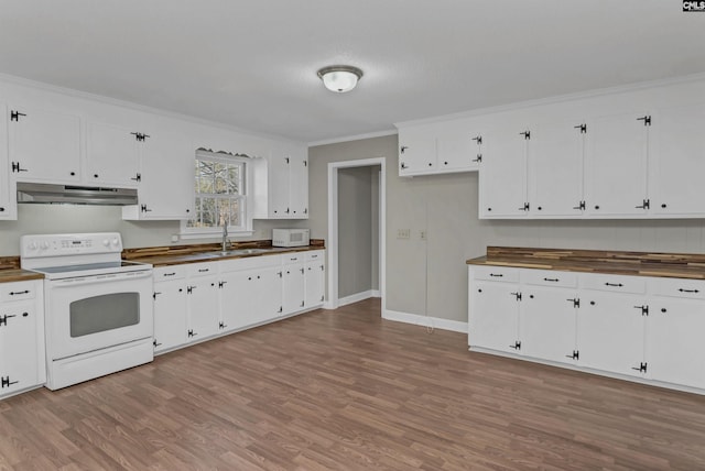 kitchen featuring white cabinetry, ornamental molding, and white appliances