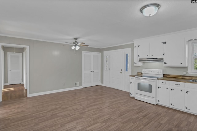 kitchen with ceiling fan, white cabinets, white electric range, and ornamental molding