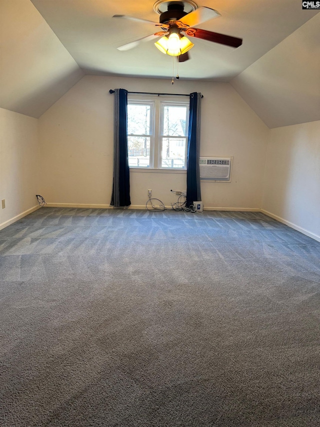 additional living space featuring ceiling fan, carpet, and vaulted ceiling