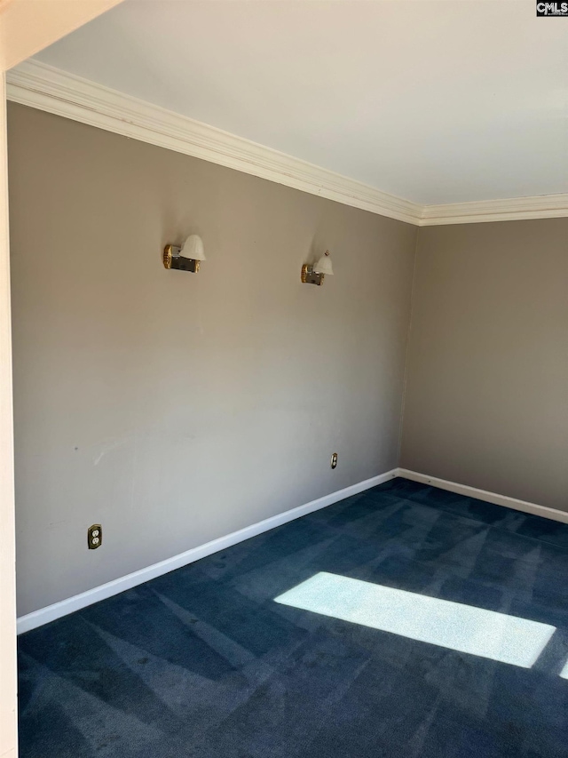 carpeted spare room with crown molding