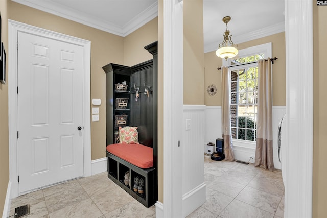 interior space featuring light tile patterned floors and crown molding