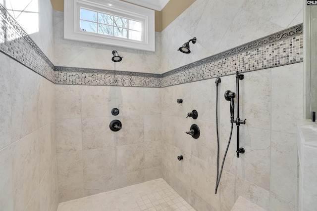 bathroom with a tile shower