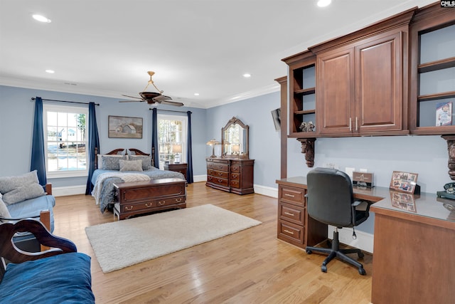 bedroom featuring light wood-type flooring and ornamental molding