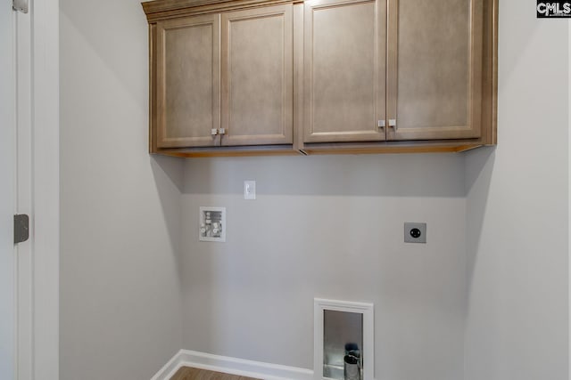 clothes washing area featuring cabinet space, baseboards, washer hookup, and electric dryer hookup