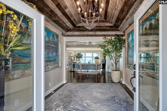 unfurnished sunroom featuring vaulted ceiling, a chandelier, and wood ceiling