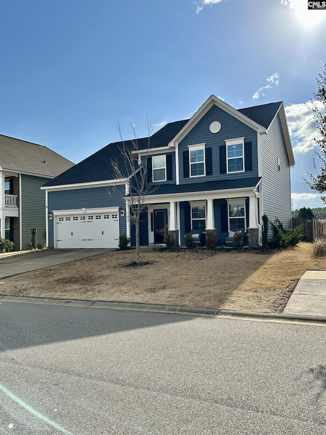 view of front of property with a garage