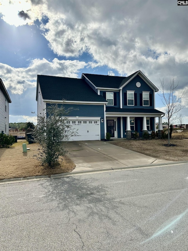 view of front of property featuring a garage