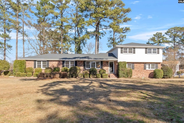 view of front of home featuring a front yard