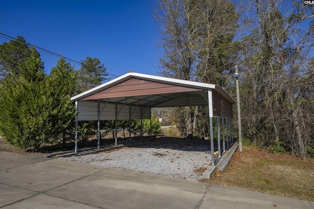 view of parking / parking lot with a carport