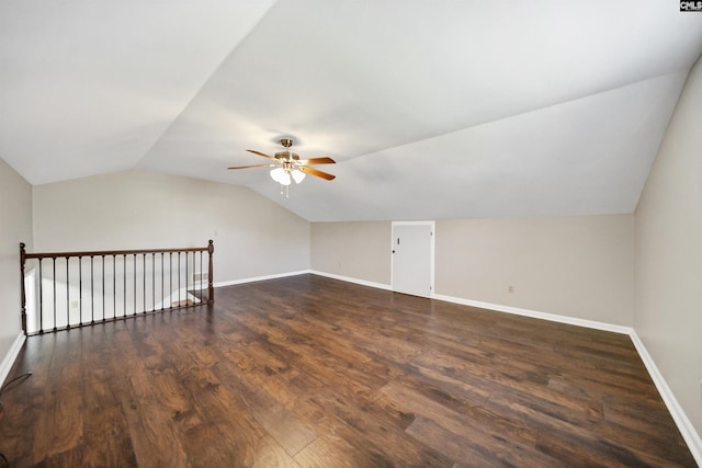 bonus room with lofted ceiling, ceiling fan, and dark hardwood / wood-style flooring