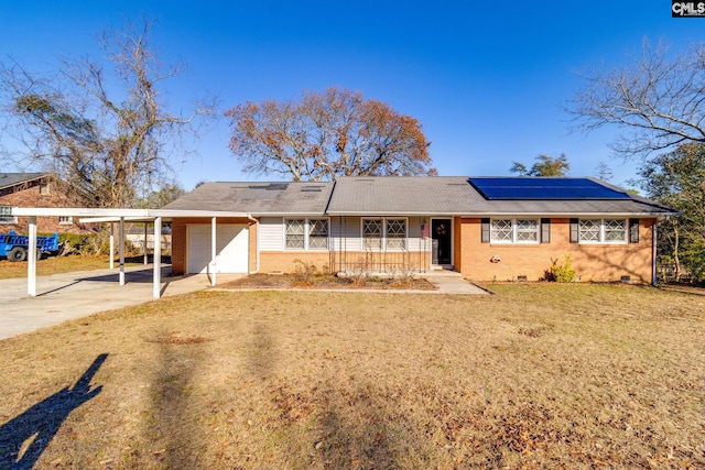 ranch-style home with a front yard, a carport, covered porch, and a garage