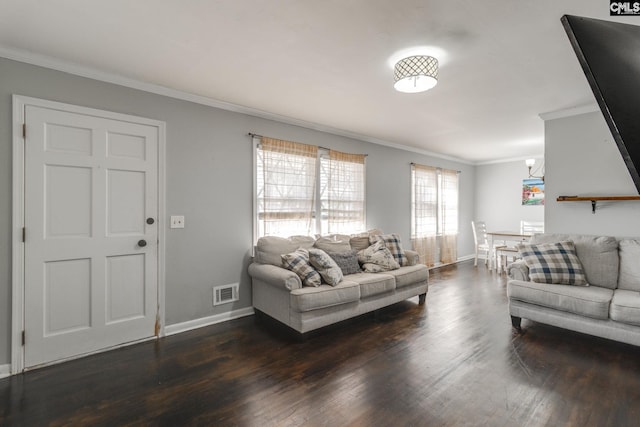 living room featuring dark wood-type flooring and ornamental molding