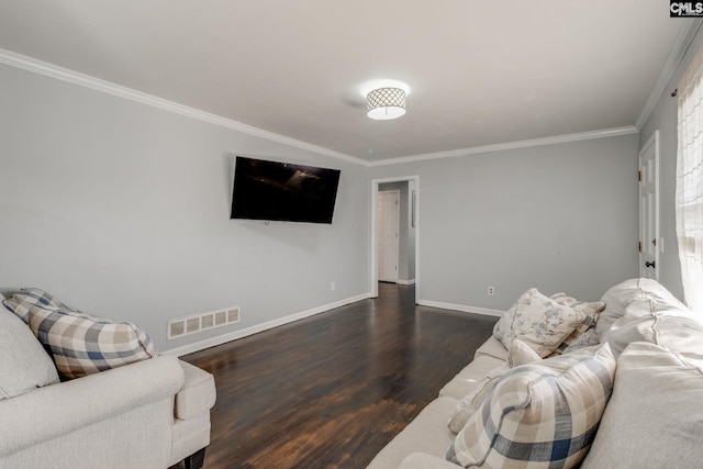 living room featuring dark hardwood / wood-style floors and ornamental molding