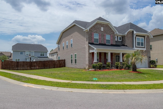 craftsman-style house featuring fence, a porch, a front lawn, a garage, and brick siding