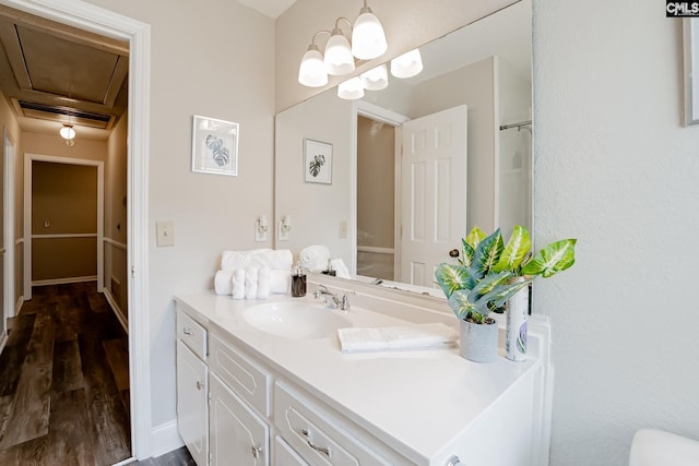 bathroom featuring vanity and hardwood / wood-style floors