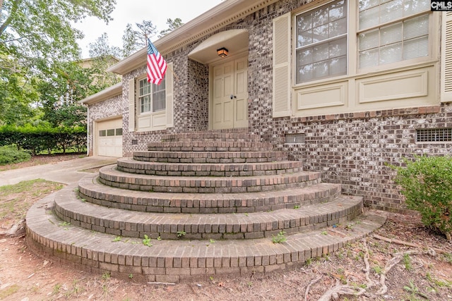 entrance to property with a garage