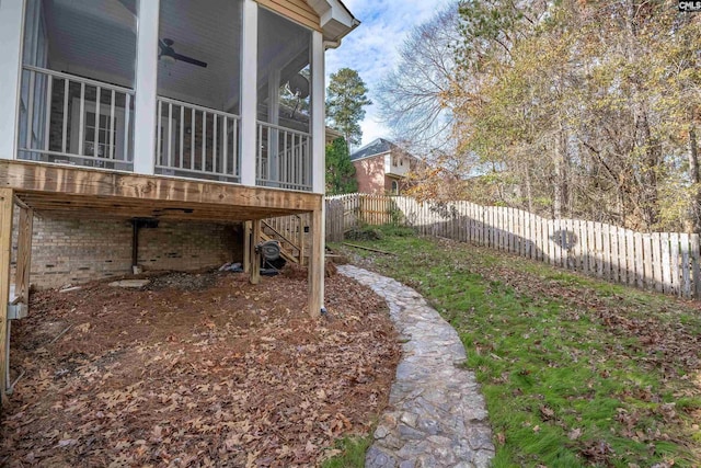 view of yard with a sunroom